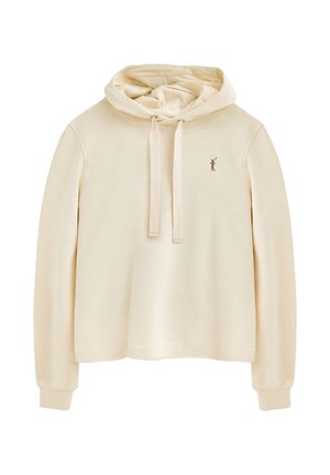 Beige Cropped Hoodie aus weichem Stoff, mit einer Kordelzugkapuze und einem kleinen braunen Logo auf der Brust. Lange Ärmel mit gerippten Bündchen.
