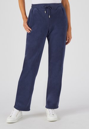 Navy blue fleece sweatpants with elastic waistband, drawstring, and side pockets, featuring a straight-leg design and soft texture.