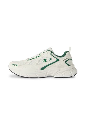 Zapatilla deportiva blanca con detalles verdes, paneles de malla, suela gruesa acolchada y logo de Champion en el lateral, vista desde el exterior.