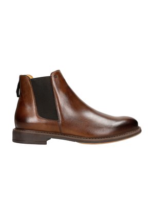 Bottine Chelsea en cuir marron avec des panneaux élastiques sur les côtés, bout rond et petit talon empilé. Présente une finition lisse et des détails de couture minimalistes.