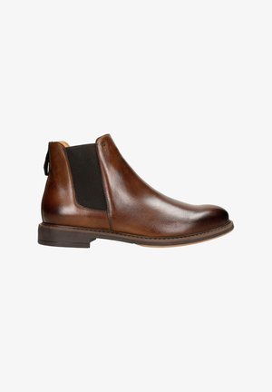 Bottine Chelsea en cuir marron avec des panneaux élastiques sur les côtés, bout rond et petit talon empilé. Présente une finition lisse et des détails de couture minimalistes.