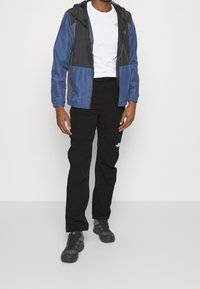 The North Face Ulkohousut - black