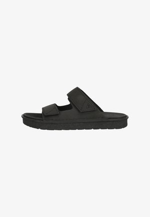 Svarta slide-sandaler med två justerbara remmar, en texturerad sula och en minimalistisk design med platt profil.