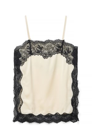 Kreemikas satiinist kampsun õhukeste rihmadega, millel on musta lillesatsiga pitsi äär topi, külgede ja ääre peal.