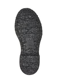 Suela de zapato negra texturizada con el logo "WALDEN CAMPER" y la talla 42 embellecidos en el centro sobre un fondo blanco.