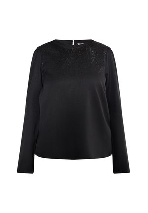Blusa negra de mangas largas con un patrón de lentejuelas texturizadas en la parte superior delantera, escote redondo y cierre de cremallera en la espalda. Tejido suave.
