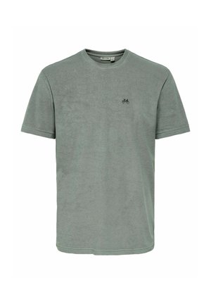 Jasnozielona koszulka z krótkim rękawem i okrągłym dekoltem z małym czarnym logo roweru po lewej stronie na piersi, prosty design, bawełniana tkanina.