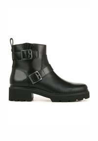 Bottines en cuir noir avec deux boucles réglables, bout rond et semelle en caoutchouc texturé. Comprend une languette pour faciliter l'enfilage.