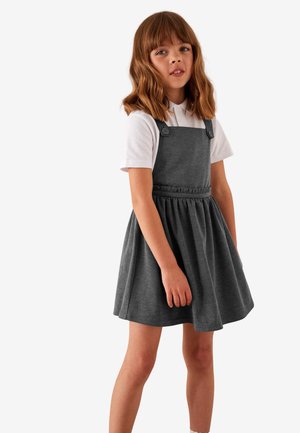 Halli puuvillane kleit laieneva seelikuga ja reguleeritavate rihmadega, millel on kaks nööbi aksenti ja kogutud vöökoht. All on valge kraega särk.