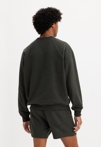 Levi's® RELAXED CREW UNISEX - Felpa - pirate black