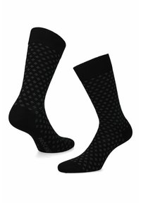 Czarne skarpetki z subtelnym wzorem diamentów w ciemniejszym odcieniu czerni. Wykonane z miękkiego materiału z żebrowanym mankietem dla wygody.
