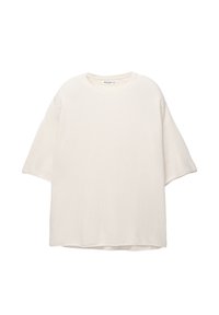 Top bianco, morbido e ampio a maniche corte realizzato in tessuto texturizzato, con scollatura tonda e orlo dritto. Nessuna chiusura o motivo visibile.