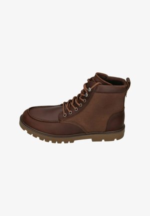 Braunleder- und Stoffstiefel mit schnürbarem Design, gepolstertem Kragen und Gummisohle, ausgestattet mit Metallösen und einer strukturierten Oberfläche.