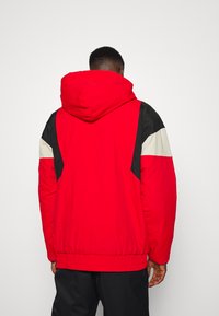 DC Shoes TRANSITION REVERSIBLE ANORAK - Casaco de snowboard - racing red