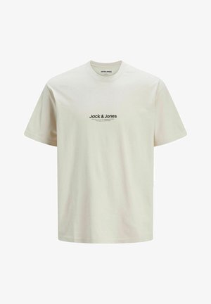 Jasno beżowa bawełniana koszulka z okrągłym dekoltem, z czarnym nadrukowanym logo "Jack & Jones" z przodu. Krótkie rękawy, luźny krój.