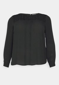 Blusa nera a maniche lunghe con dettaglio in pizzo sul corpetto, caratterizzata da sottili pieghe e scollatura tonda, realizzata in materiale leggero e morbido.