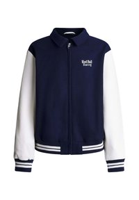 Marineblå og hvid varsityjakke med lynlås foran, stribede ribmanchetter og kant, samt "Red Bull Racing" logo på venstre bryst.