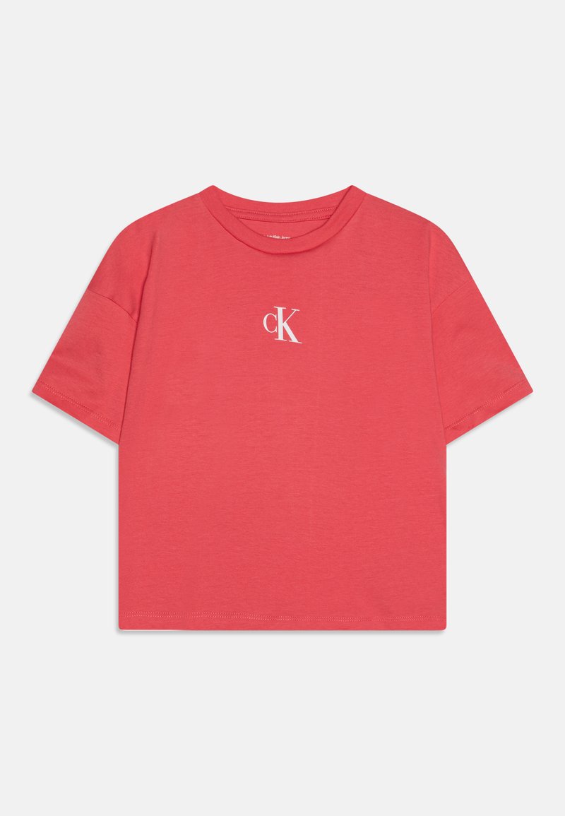 Koraļļu rozā T-krekls no mīksta kokvilnas, ar apaļu kakla izgriezumu un īsām piedurknēm, uz krūtīm ar mazu baltu 'cK' logotipu.