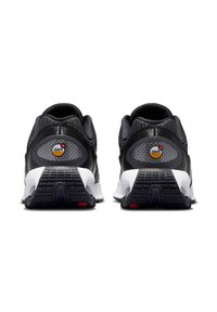 Black mesh and synthetic athletic shoes with padded collars and white midsoles. Features textured black outsoles and visible air cushioning elements.