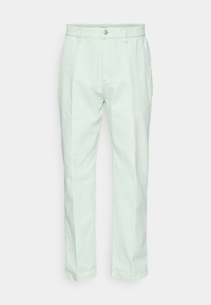 Heledad helesinised puuvillased püksid, millel on sirge jalg ja esine nööbiga sulgemine koos tõmbluku jaotusega. Sile tekstuur.