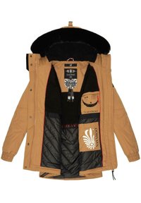 Tan parka jacket with black fur lining, quilted black interior, and multiple pockets. Features logo prints and contrasting red accents.