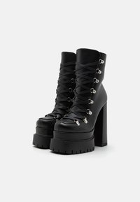 RAID KAMALA - Botines con plataforma - black