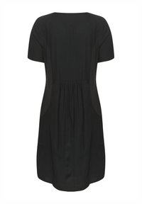 Black short-sleeve dress with a loose fit, side pockets, gathered detail at the back, and smooth texture. Simple, minimalist design.