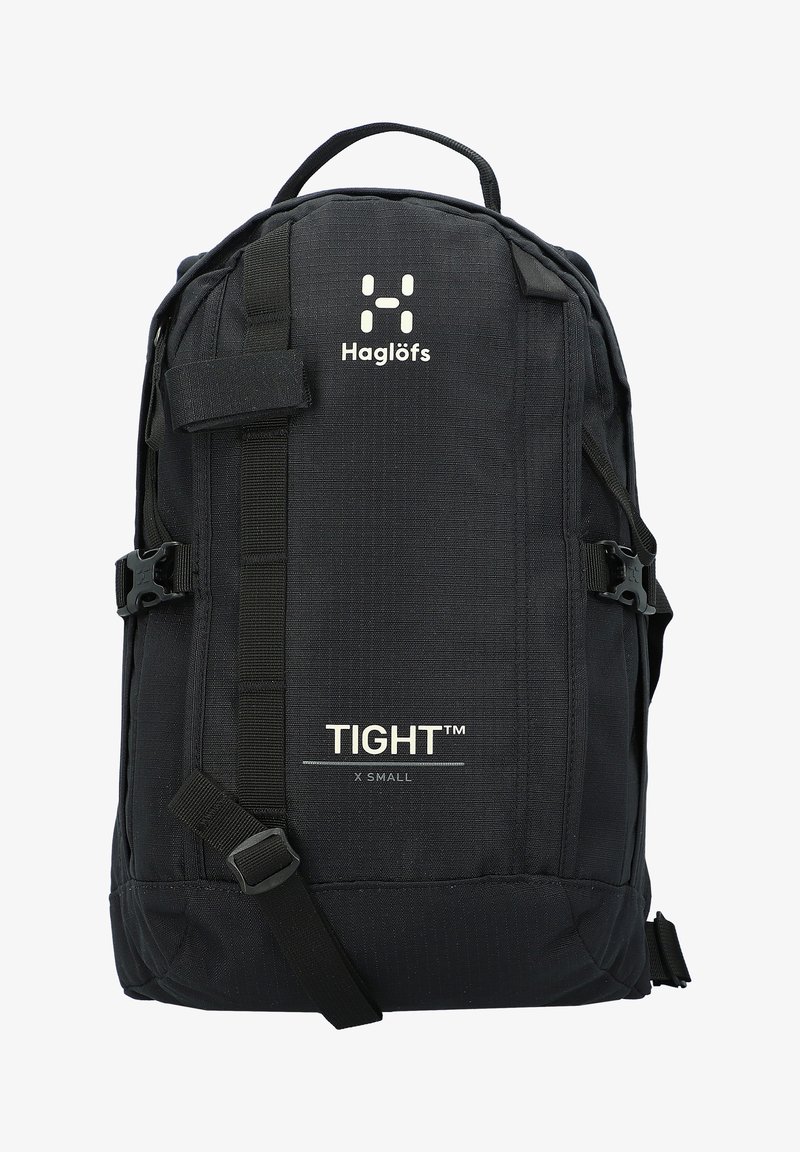 Zwarte rugzak gemaakt van gestructureerde stof, met verstelbare bandjes, zijklikken en een logo. Kleine maat gelabeld "TIGHT™."