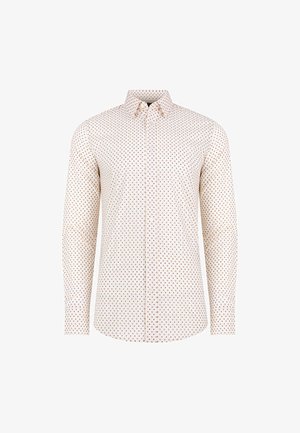 Jasna koszula zapinana na guziki z wzorem w kolorowe kropki. Długie rękawy, standardowy kołnierz i gładka faktura materiału.
