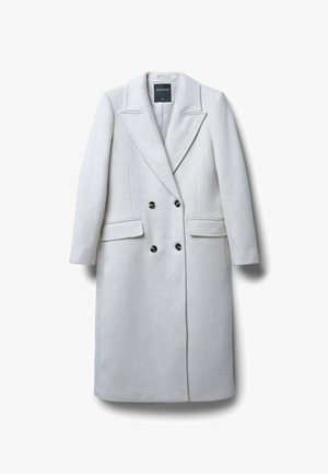 Double-breasted coat in light gray wool, featuring a notched collar, two front pockets, and black buttons for closure. Smooth texture.