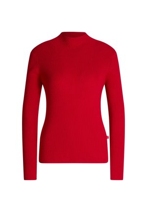 Pull à col roulé rouge à côtes avec manches longues, présentant une texture lisse et un design ajusté. Petite étiquette logo sur le côté.