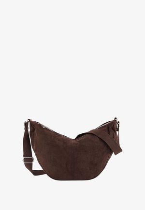 Braune Wildleder-Schultertasche mit geschwungener Form, Reißverschluss und verstellbarem Träger. Sie zeichnet sich durch eine glatte Textur und ein minimalistisches Design aus.