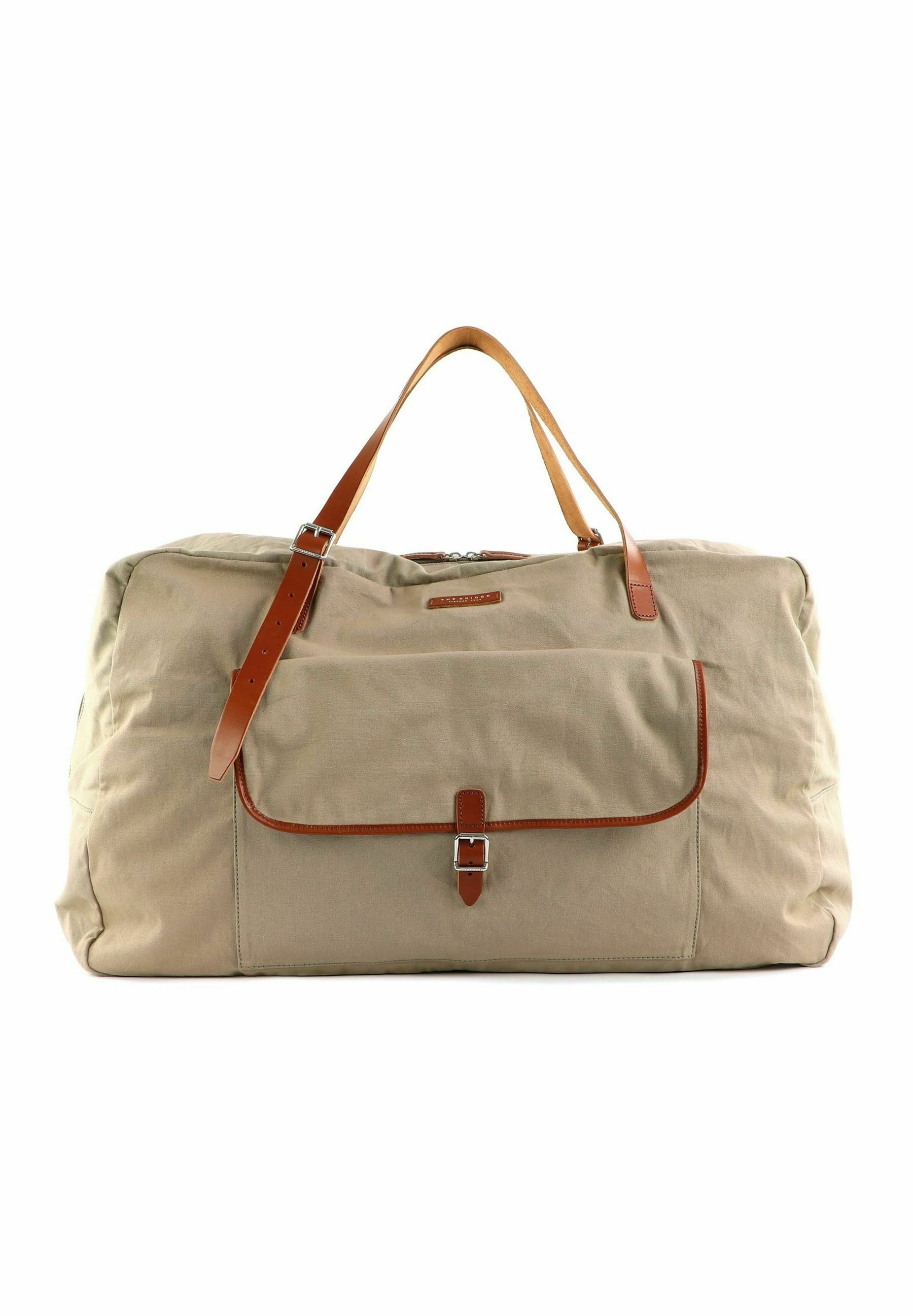 LANCEL - Sac de voyage en toile beige et cuir fauve. Environ 32 x 44,5