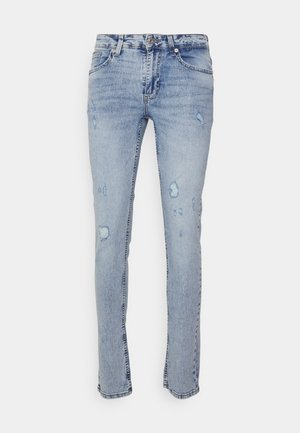 Hellblaue Skinny-Jeans aus verblasstem Denim mit mehreren zerstörten Stellen, traditionellem Fünf-Taschen-Design und einem normalen Bund.