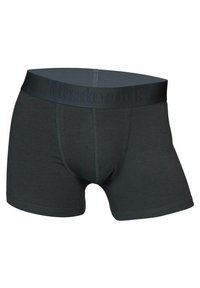 Schwarze Baumwollboxershorts mit glatter Textur, ausgestattet mit einem breiten, geprägten Bund und kontrastierenden Nähten.