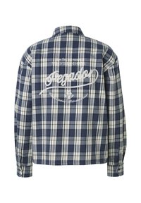 Chemise à manches longues à carreaux bleu et blanc avec texte et logo brodés en blanc au dos indiquant « Ategnor » ainsi qu'un petit texte supplémentaire.