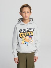 Felpa grigia con cappuccio con una grande grafica "STUMBLE GUYS" con personaggi dei cartoni animati, tra cui una banana e una persona con un cappello verde, sul davanti.