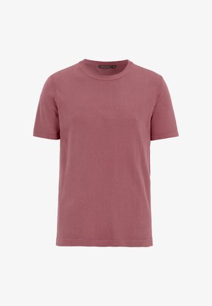 T-shirt z krótkim rękawem w stonowanym różowym kolorze, wykonany z miękkiej bawełny. Posiada klasyczny okrągły dekolt i luźny krój.