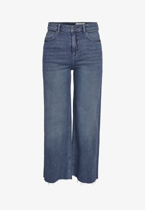 Sinine laiade jalgadega teksad kõrge vöökohaga, esiküljel nööp ja tõmblukk, viis taskut ning kulunud servad.