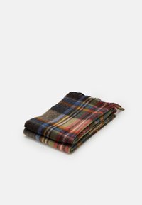 Plaid scarf in soft wool blend, featuring green, red, blue, and yellow tones. Folded with fringed edges for texture and detail.
