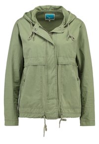 Lysegrøn hættejakke lavet af bomuldsblanding. Har snørre i taljen, to foran lommer og lynlås med en let tekstureret overflade.