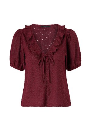 Bordowa koronkowa bluzka z bufkami, marszczonym dekoltem w kształcie litery V i wiązaniem z przodu.