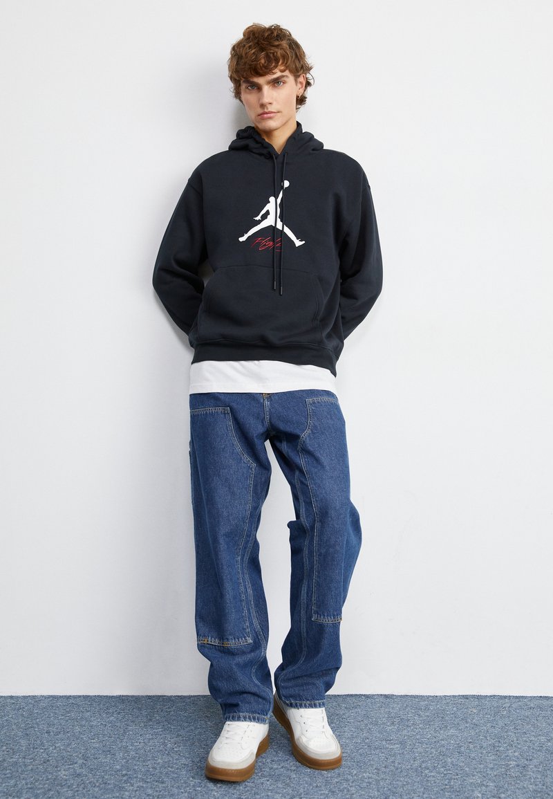 jordan varsity hoodie black and white