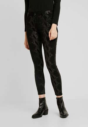 Vaqueros pitillo - black