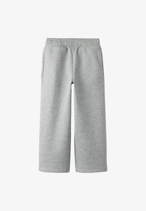 Grijze sweatpants van zachte stof met een elastische tailleband, wijde benen en twee zijzakken. Eenvoudig ontwerp zonder patronen of accenten.