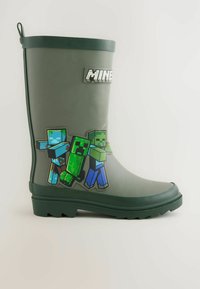 Zelené gumové dažďové čižmy s pixelovými postavami z Minecraftu na boku, s textúrovanými akcentmi a plochou podrážkou pre lepšiu trakciu.