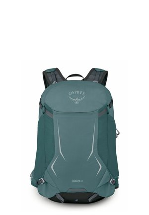 Sac à dos de randonnée Teal Osprey Hikelite 28 avec bretelles rembourrées, détails réfléchissants à l'avant et sangles de compression latérales.