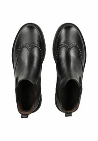Stivali alla caviglia in pelle nera con cuciture decorative e dettagli in borchie. Punta arrotondata, pannelli laterali elastici e un linguetta sul retro.
