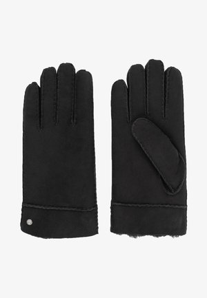 Guantes de cuero negro con cinco dedos, que presentan una textura suave y detalles de costura. La muñequera tiene un pequeño acento metálico.