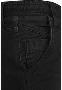 Urban Classics Laisvo kirpimo džinsai - black washed